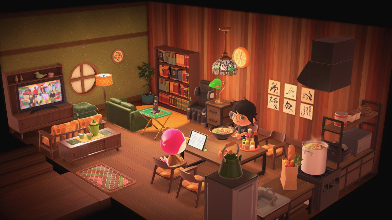 Room View 1 of an Animal Crossing Happy Home design with a green wall and vertical plank wood accent wall. Kitchen furniture: iron wood shelf, microwave, rice cooker, stove, ventilation hood, miso ramen broth pot, bag of groceries, sink, refrigerator, kettle. Dining room furniture: iron wood table, wooden chairs with orange fabric seats, bowl of ramen, sauce carousel, mug, tablet with book on the screen. (Midge and my Animal Crossing character are sitting at the dining table.) Living room furniture: sideboard table with tea set on top, couch facing tv on stand with bird decorations on it, another couch facing a bookshelf, tv dinner tray with portable phone on it, massage chair, dresser drawer with lamp. Items on the wall/ceiling: six autograph cards, pin board, air conditioning unit, a stained glass light with a parrot design.