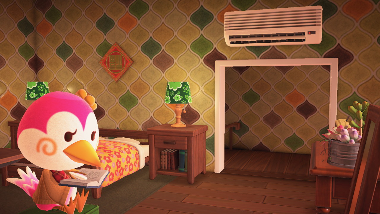 Close up of Midge in her bedroom, reading a book.